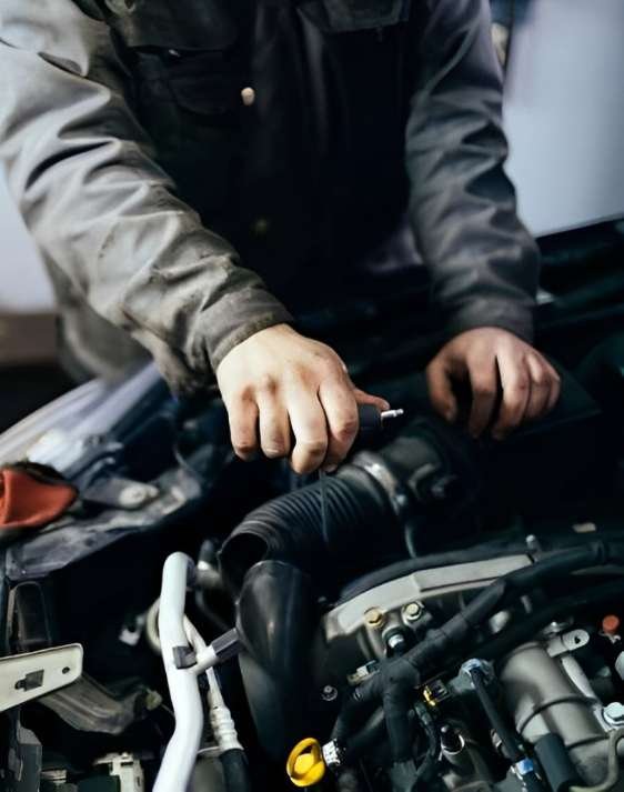 mechanic repairing engine