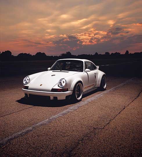 White Porsche car at a professional Service garage in Muscat oman.